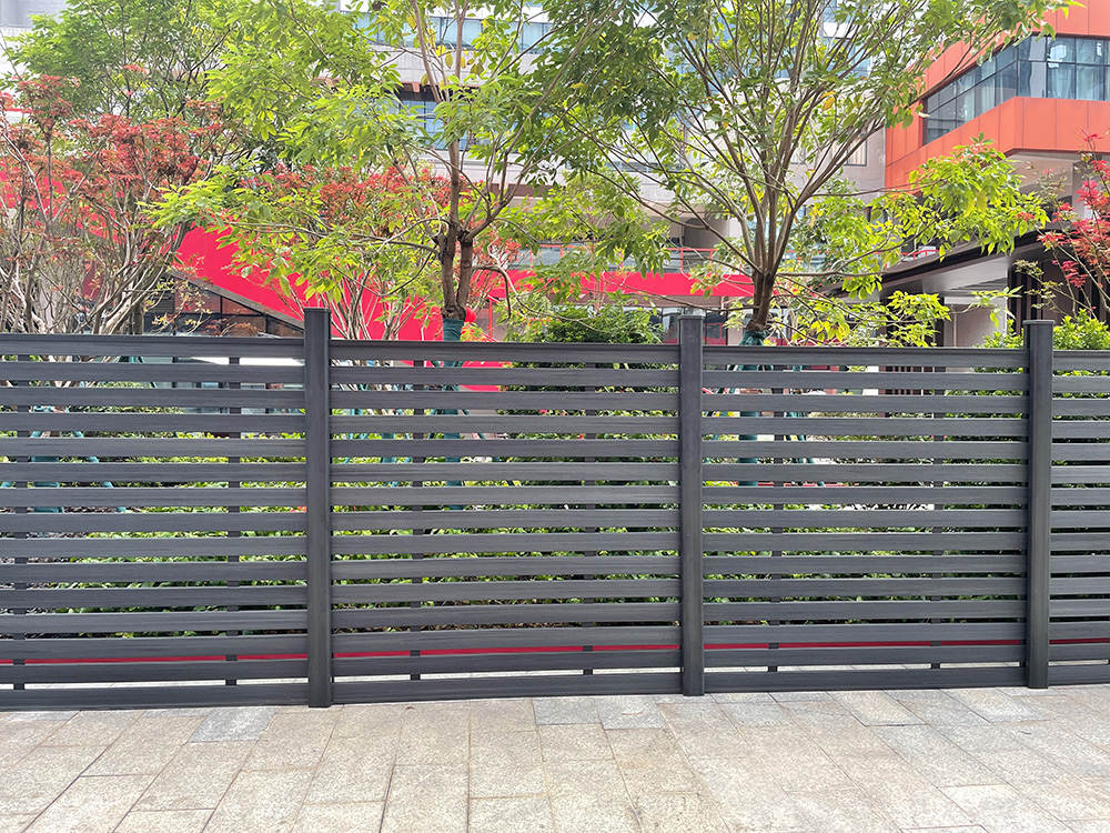 Fencly Mid and Full Trellis — open-board WPC composite fence panels used as a garden screen for airflow and climbing plants.